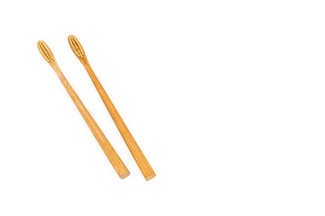 Bamboo toothbrush on white background.