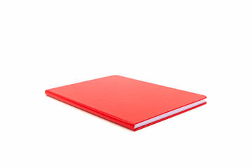 Close up red leather notebook on white background.