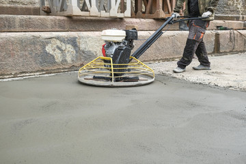 builders poured concrete at the construction site