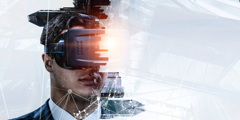 Abstract image of virtual reality experience, a man in VR glasses