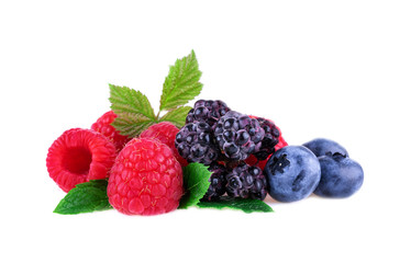 Mix berry raspberries blueberries blackberries with mint leaf isolated on white background