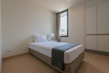 Modern interior design in small apartment with bedroom