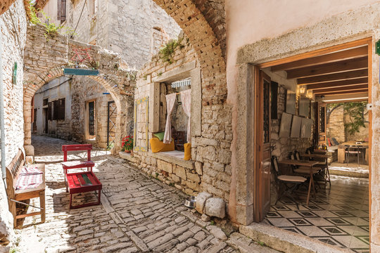 Fototapeta Narrow stone street in Bale, Istria, Croatia