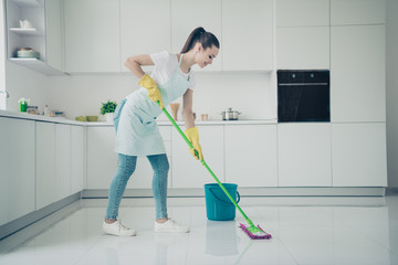 Photo of amazing astonishing girlfriend supporting her mother about cleaning kitchen up while she...