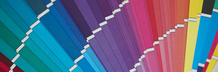 Opened multicolour semicircle sample palette at unusual angle view macro