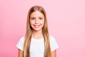 Photo of enjoying rejoicing nice girlstanding in front of pink background she is isolated with
