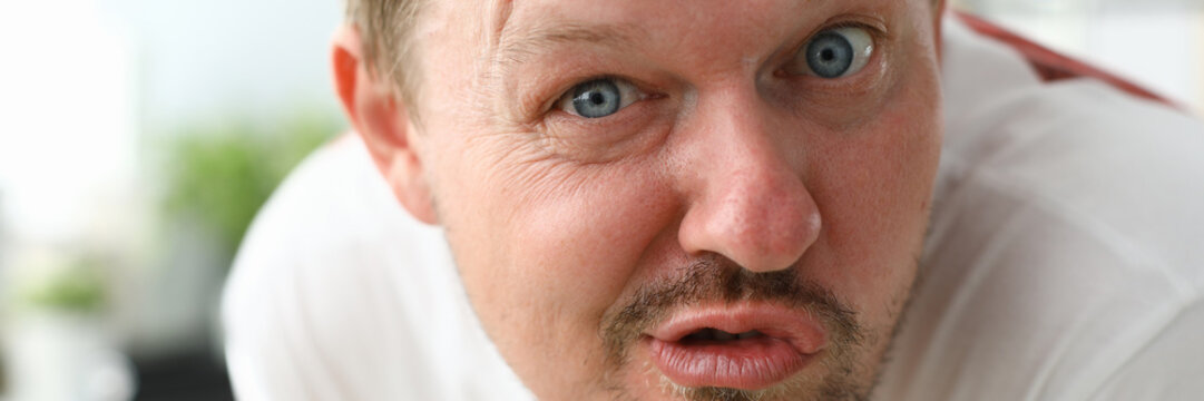 Angry man hater gaze into the camera at the interlocutor
