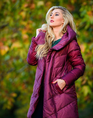 Woman wear extra volume jacket. Girl fashionable blonde walk autumn park. Jackets everyone should...