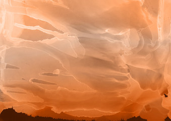 Hand painted alcohol ink background. Abstract delicate orange texture. Contemporary autumn wallpaper. 