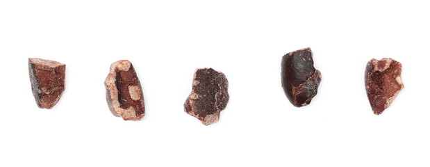 Chopped cocoa pieces set and collection isolated on white background, macro, top view