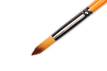 Paintbrush macro isolated on white background, top view