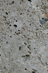 Old cement floor with holes, Rough concrete texture, Stone wall