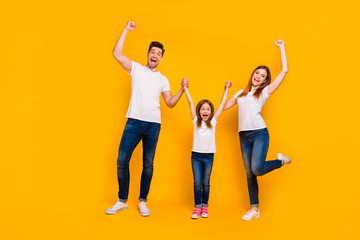 Full length body size view of three nice attractive charming lovely stylish cheerful cheery crazy person having fun weekend great news rejoicing isolated over bright vivid shine yellow background