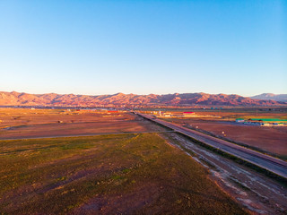 Aerial view of the road leading to Dogubayazit from Igdir. Plateau around Mount Ararat, mountains and hills. Eastern Turkey on the border with Armenia and Iran