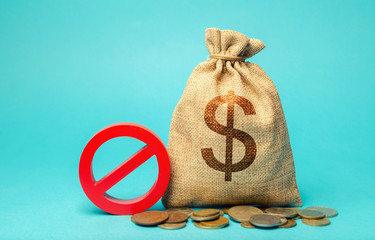 Money bag and sign of prohibition. Restrictions on the export of capital. Economic pressure and...