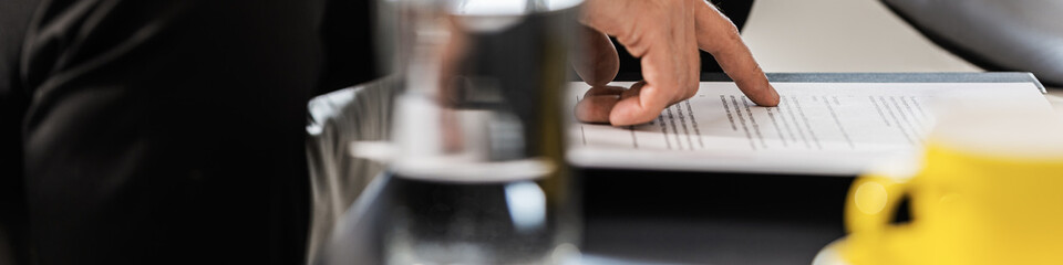 Businessman proofreading a document or contract
