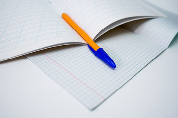 notebook with pencil and eraser