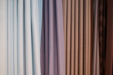 Choosing a curtain at a furniture store