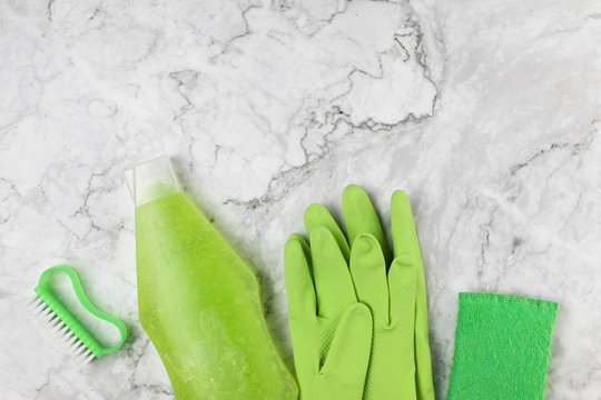 Flat Lay Green Cleaning Products On Marble Background