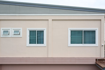 Windows on the outside of a house.