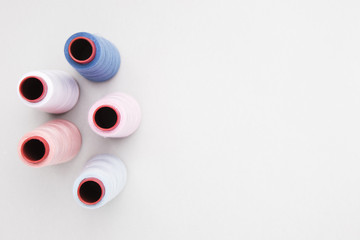 Reels of yarn on white background