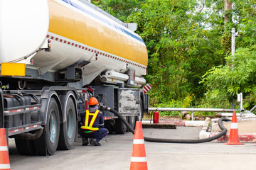 Fueling Up a Freight Transport Truck,Fuel Delivery Tanker