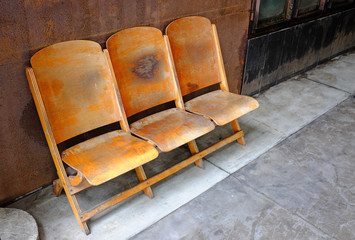 Fototapeta na wymiar Set three wooden chairs at balcony.