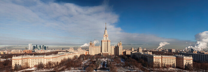 Panoramic top view of the building of Moscow State University in the winter sunny day. Moscow, Russia