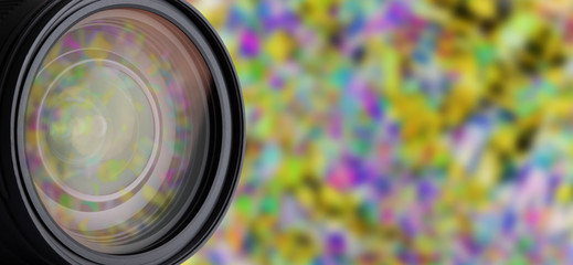 DSLR Camera Lens Isolated. Closeup Reflections in Lens. Blurred Background and Abstract Bokeh.