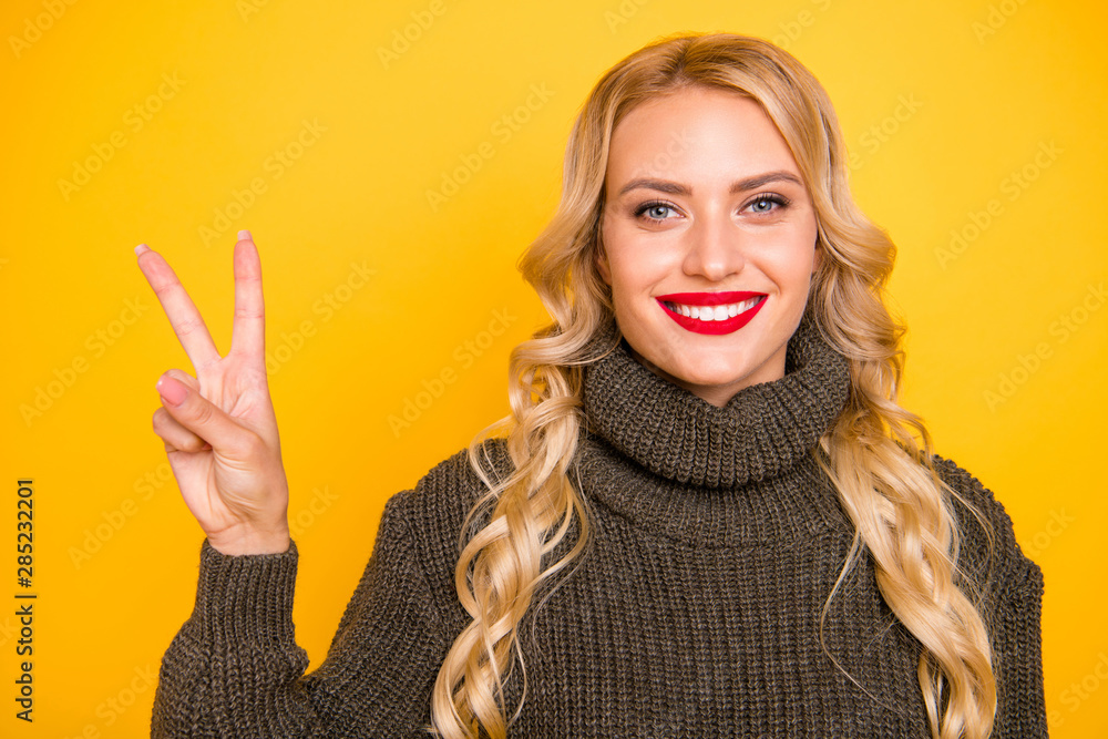 Sticker Photo of amazing lady showing v-sign symbol wear warm jumper isolated yellow background