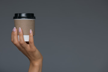 Take Away White Paper Hot Coffee Cup With Right Hand Holding.