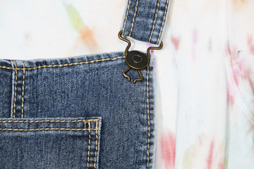 Close-up blue denim overalls upper part