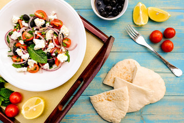 Fototapeta na wymiar Greek Style Feta Cheese and Fresh Salad