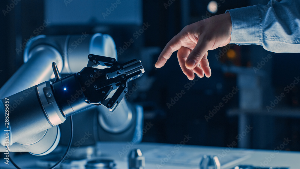 Poster Futuristic Robot Arm Touches Human Hand in Humanity and Artificial Intelligence Unifying Gesture. Conscious Technology Meets Humanity. Concept Inspired by Michelangelo's Creation of Adam