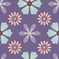 Seamless pattern of large purple, blue and pink flowers on a dark purple background.
