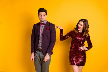 Portrait of his he her she nice attractive lovely funny pretty smart cheerful cheery confused people meeting 1st time know each other isolated over bright vivid shine yellow background