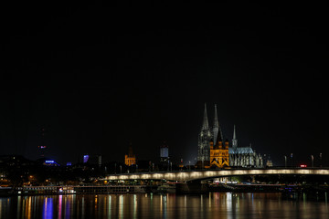 Fototapeta na wymiar Cologne a city on the Rhine at night as a skyline