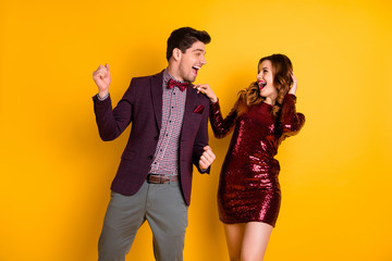 Fototapeta premium Portrait of his he her she nice attractive pretty smart gorgeous fascinating cheerful cheery careless people having fun spending evening isolated over bright vivid shine yellow background