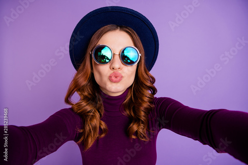 Close up photo of classy person make photo video call live send air kisses isolated over purple violet background