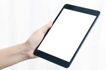 Woman hand hold white tablet with blank empty screen.