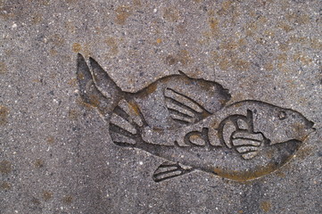 Wall carved with a picture of fish