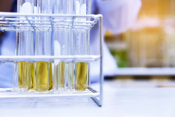 Lab glassware, science laboratory research and development butanol for future renewable energy oil. Study in university.