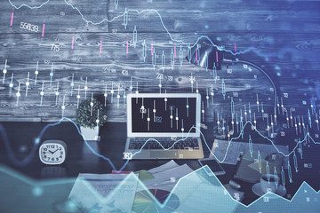Multi exposure of graph and financial info and work space with computer background. Concept of...