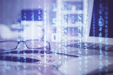 Data tech hologram with glasses on the table background. Concept of technology. Double exposure.