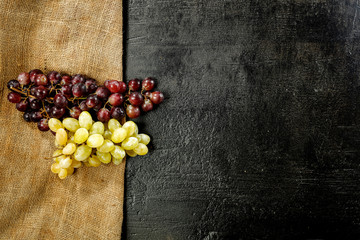 Black space and grapes fruits 