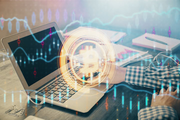 Blockchain theme hologram with man working on computer on background. Concept of crypto chain. Double exposure.