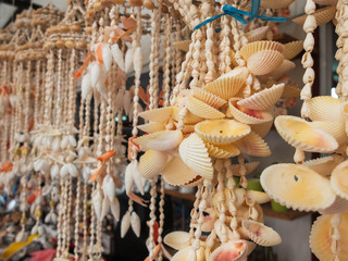 Traditional colorful home decorations made from different shape and color seashells.