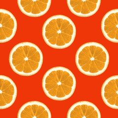 Obraz premium Orange seamless pattern Slices of citrus fruit on an orange background Retro style