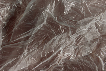 Cropped shot of plastic bag. Cellophane background, close up. Plastic, environment concept.