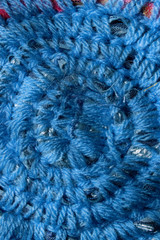 Abstract colorful background. Blue texture background with a lot of copy space for text. handmade knitted product, blue colors. 